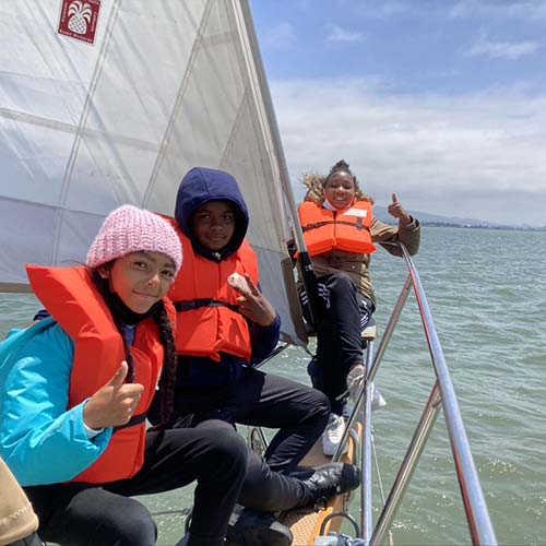 Kids on the Pegasus bowsprit