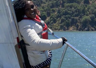 Smiling girl on the Pegasus bowsprit
